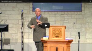 Pastor delivering sermon at church podium