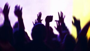 People enjoying live music concert atmosphere.