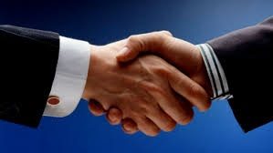 Business handshake symbolizing partnership and agreement