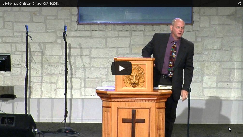 Pastor delivering sermon at Christian church service.