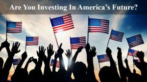 People waving American flags in the sunset