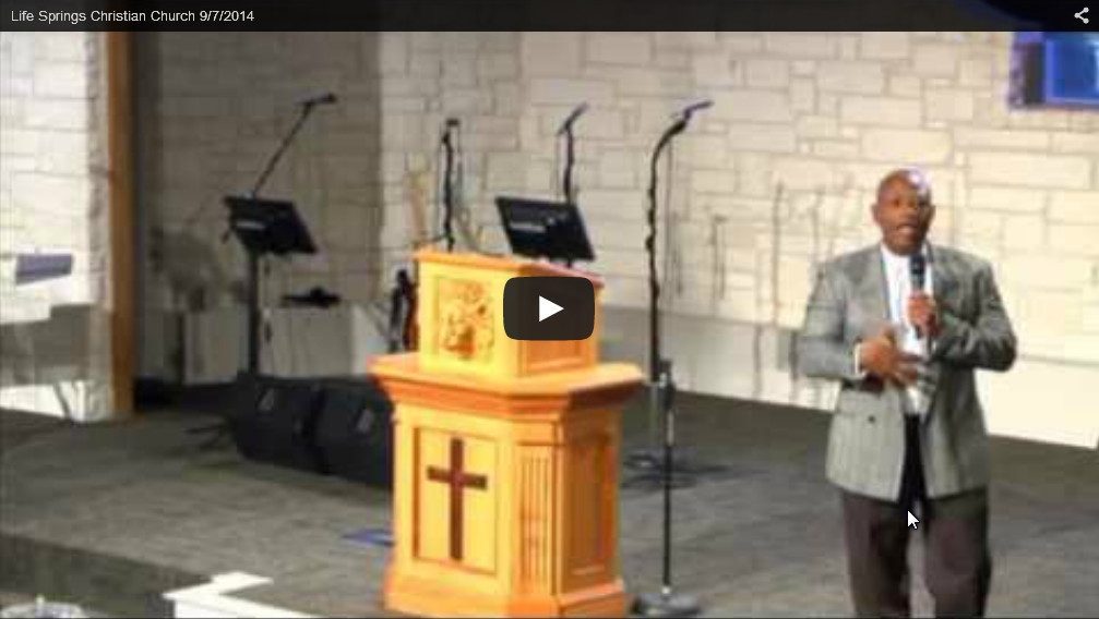 Speaker giving sermon at Life Springs Church