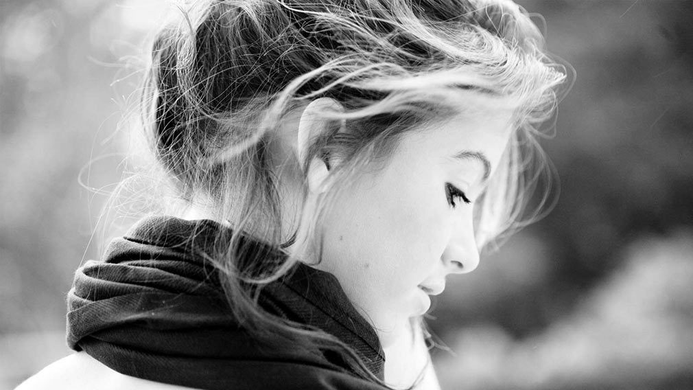 Black and white portrait of a woman.