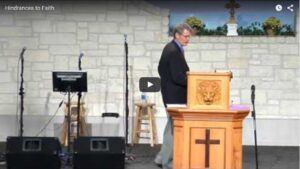 Pastor delivering a sermon in a church