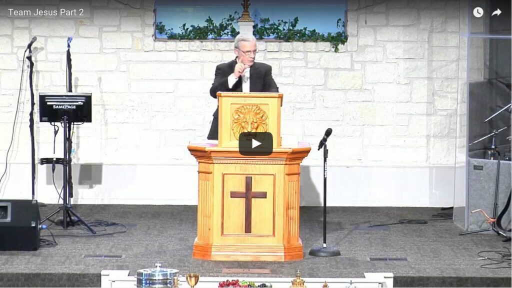 Pastor delivering sermon at church pulpit service