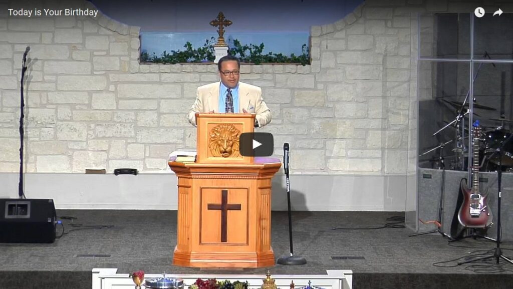 Pastor giving sermon at church podium