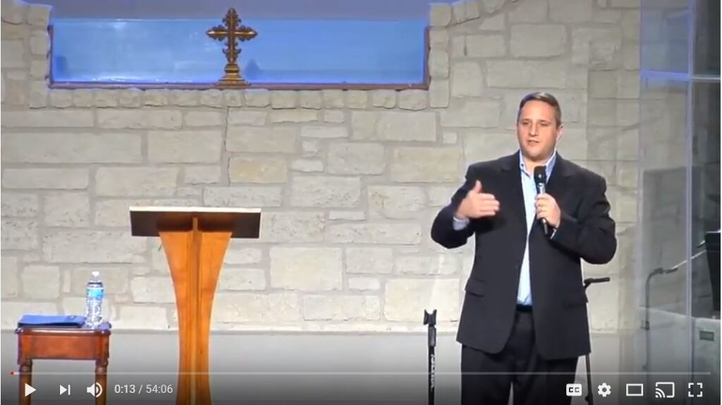 Speaker delivering a presentation in a church