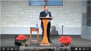 Speaker giving a sermon in a church