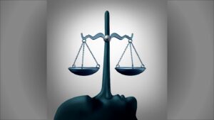 Balancing scales concept with human profile