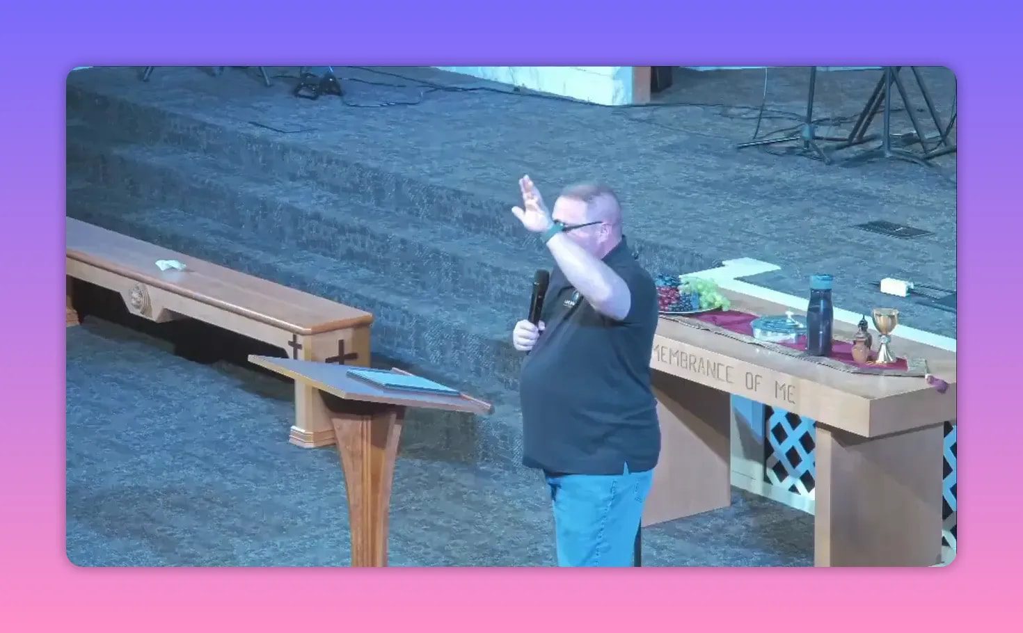Speaker preaching about the risen Christ reigning as King during Easter Sunday message