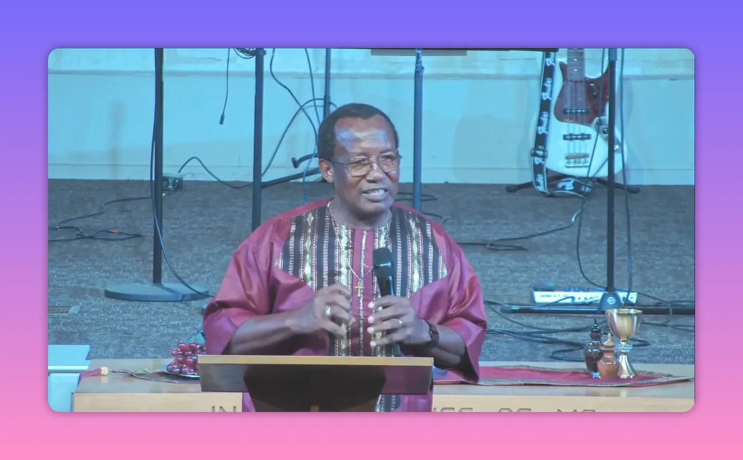 Pastor delivering a sermon at church lectern while addressing limitations and freedom