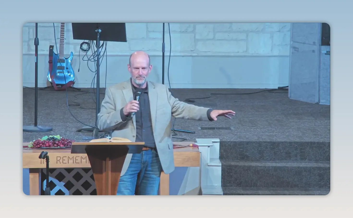 Pastor speaking from a church pulpit during a Mother’s Day message